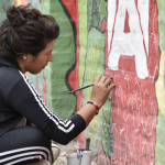Mujeres muralistas en Malvinas Argentinas